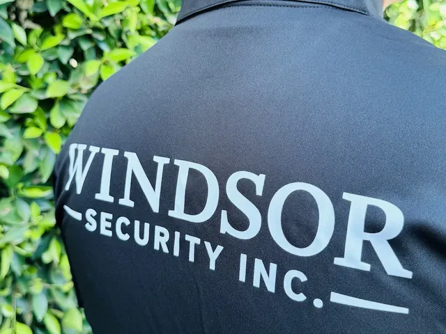 Windsor Security Inc. lettering on the back of an officer uniform