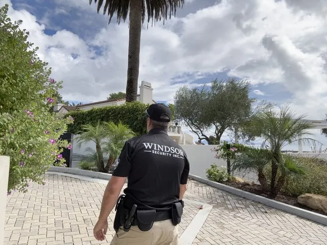 Windsor Security officer walking a patrol route through a gated community