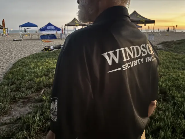 Windsor Security officer watching over event tents on the beach